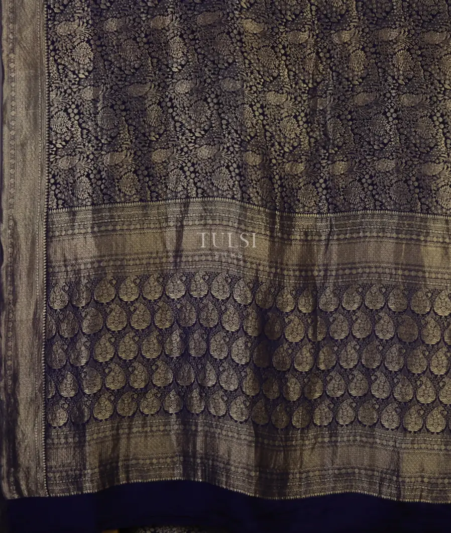 blue-georgette-silk-saree-is-embelished-with-gold-zari-design-throughout-the-body-with-a-self-blouse-t715849-t715849-d