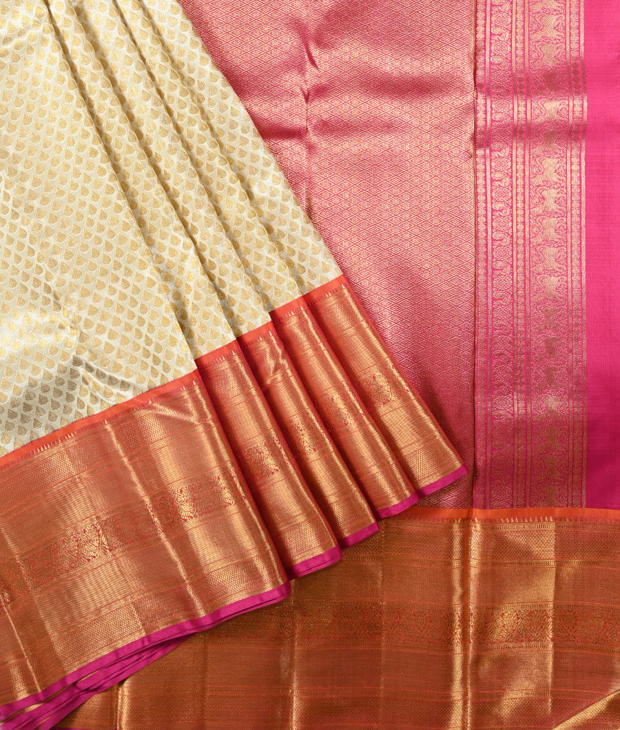 Sandal embossed silksaree,contrast border of manga,mayil,muthu & kodi  visiry,pallu of kodivisiry,muthu,mayil,floral jaal