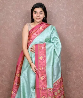 Champa Tussar Saree With Beautiful Patola Border Light Blue With Pink1