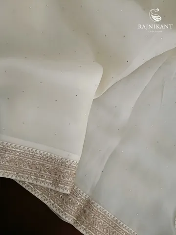 White Hued Organza Silk Saree With Mukaish Work And Velvet Blouse1