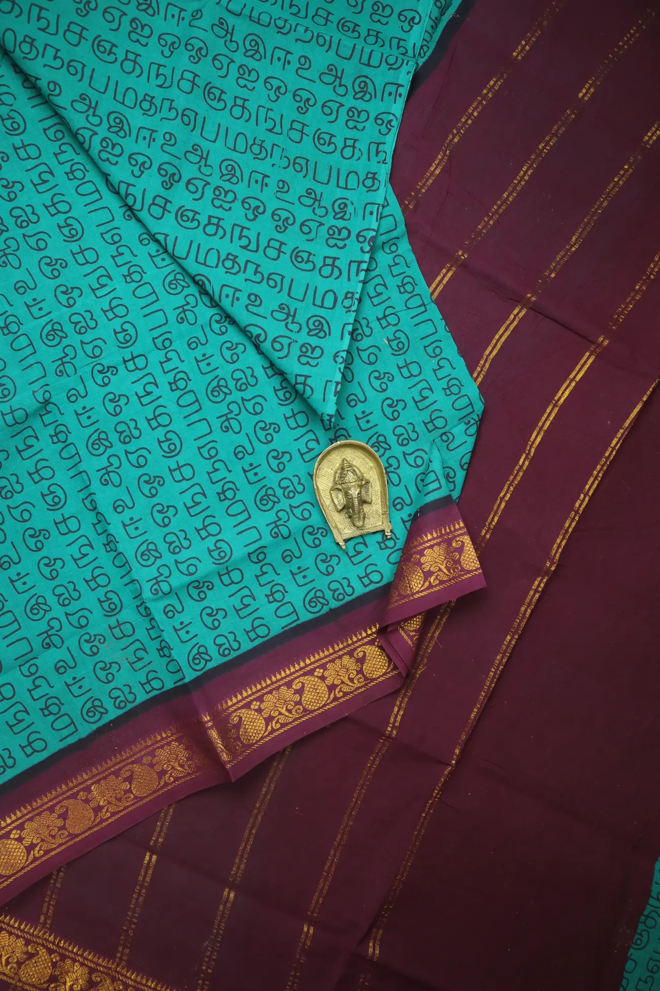 teal-tamil-alphabets-madurai-sungudi-saree-ss006442-a
