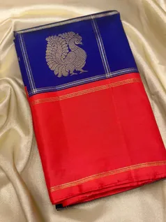 ms-blue-and-chilli-red-pure-zari-kanchi-silk-saree-with-golden-boxes-and-peacock-motifs-sw00000454-a