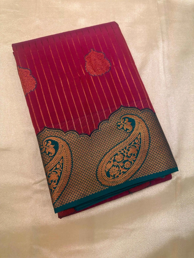 semi-silk-saree-in-maroon-with-green-gold-lines-and-mango-motifs-sw00000507-a