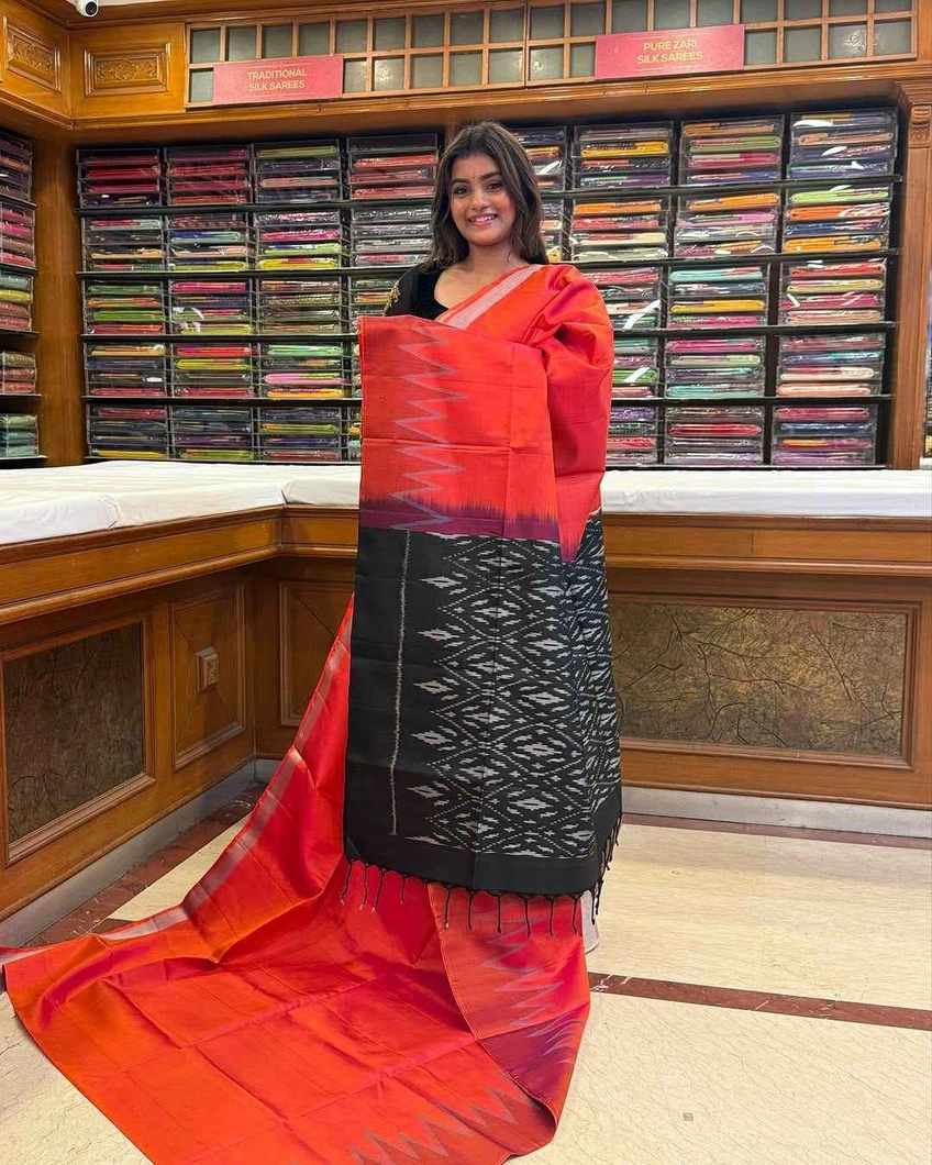 elegant-lightweight-silk-saree-in-orange-with-black-pochampally-design-temple-border-sw00000570-a