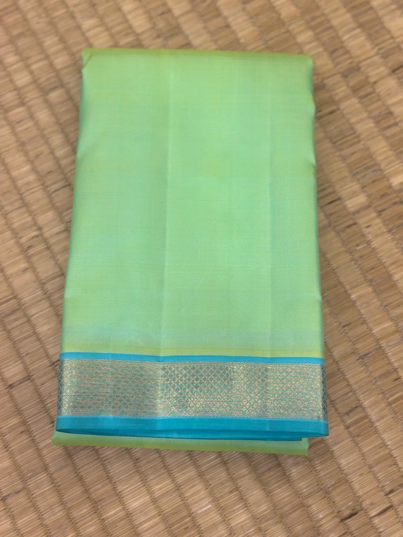 kanchi-silk-saree-in-pista-green-with-sky-blue-tiny-border-sw00000604-a