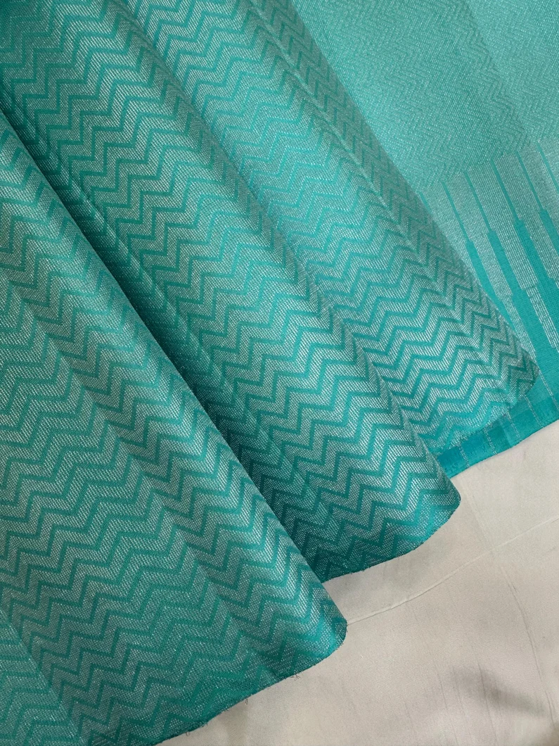 light-weight-silk-saree-in-pastel-blue-all-over-zigzag-woven-pattern-sw00000624-a