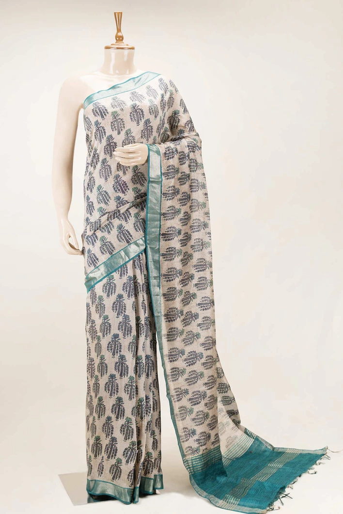 ivory-pure-tussar-silk-saree-with-teal--blue-leaf-motifs-and-contrast-border-sw00000728-a