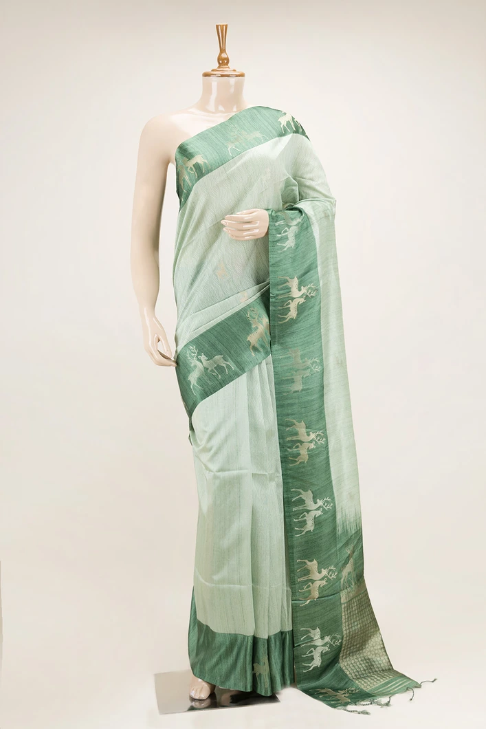 pista-green-semi-tussar-saree-with-silver-deer-motifs-and-contrast-border-sw00000730-a