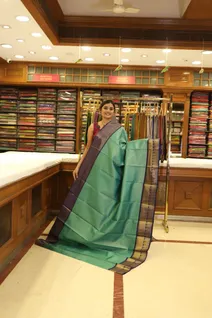 turquoise-blue-semi-silk-saree-with-navy-blue-zari-border-sw00000751-e