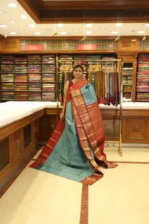 semi-silk-saree-in-blue-with-maroon-border-sw000001229-b