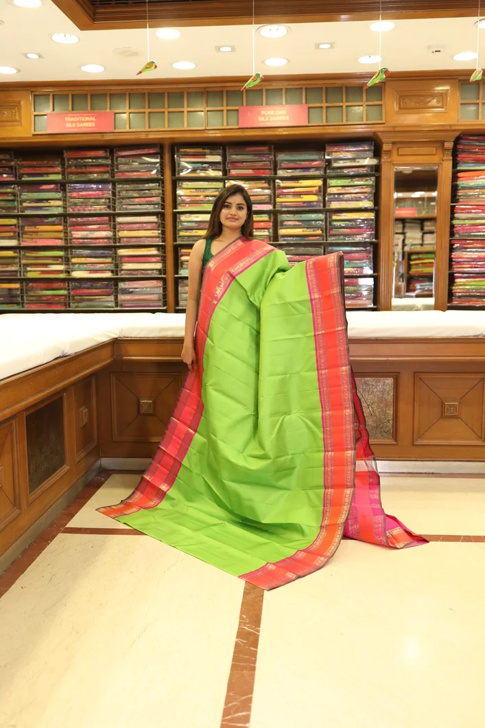 pure-zari-silk-saree-parrot-green-with-orange-pink-rettai-pettu-border-sw000001239-a