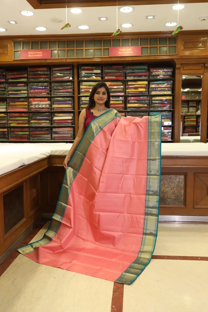 traditional-silk-saree-in-peach-with-green-border-sw000001249-a