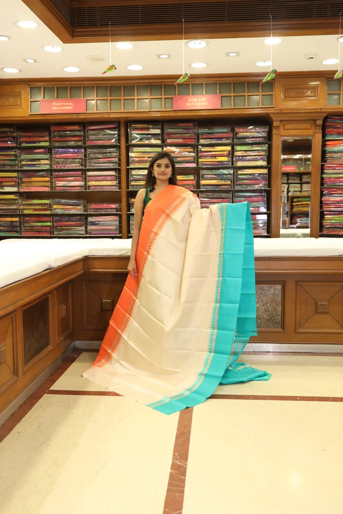 lightweight-silk-saree-in-half-white-with-orange-blue-ganga-jamuna-border-sw000001251-a