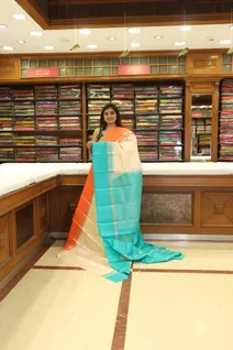 lightweight-silk-saree-in-half-white-with-orange-blue-ganga-jamuna-border-sw000001251-b