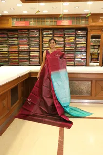 lightweight-silk-saree-in-maroon-with-aqua-blue-border-sw000001266-b