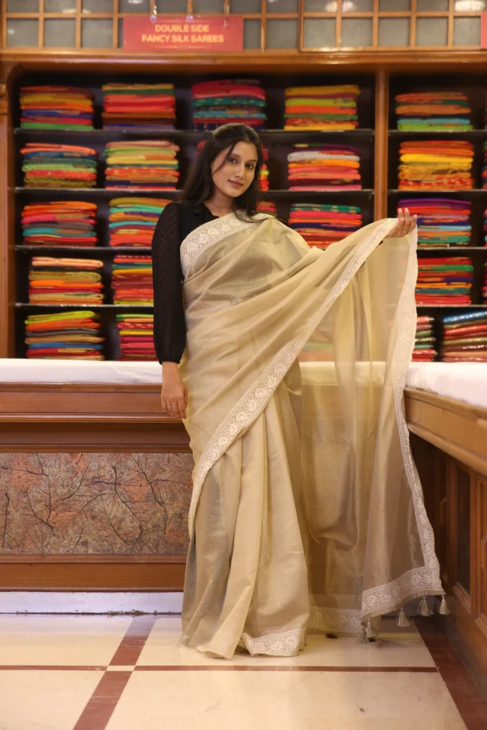 soft-tissue-saree-golden-with-minimal-embroidered-detailing-sw000001635-a
