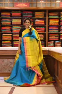 silk-cotton-peacock-blue-saree-with-yellow-pink-rettai-pettu-border-sw000001673-b