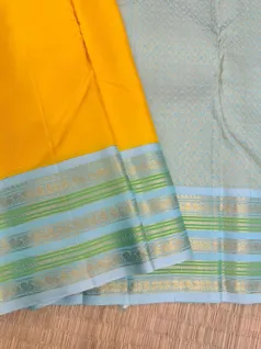 pure-kanchi-silk-saree-in-yellow-with-sea-ice-blue-varisai-pettu-border-sw000001819-b