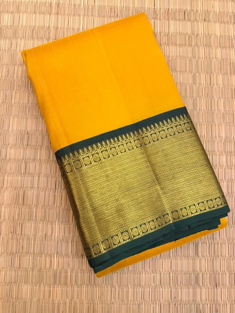 pure-kanchi-silk-saree-in-yellow-with-green-broad-border-sw000001823-a