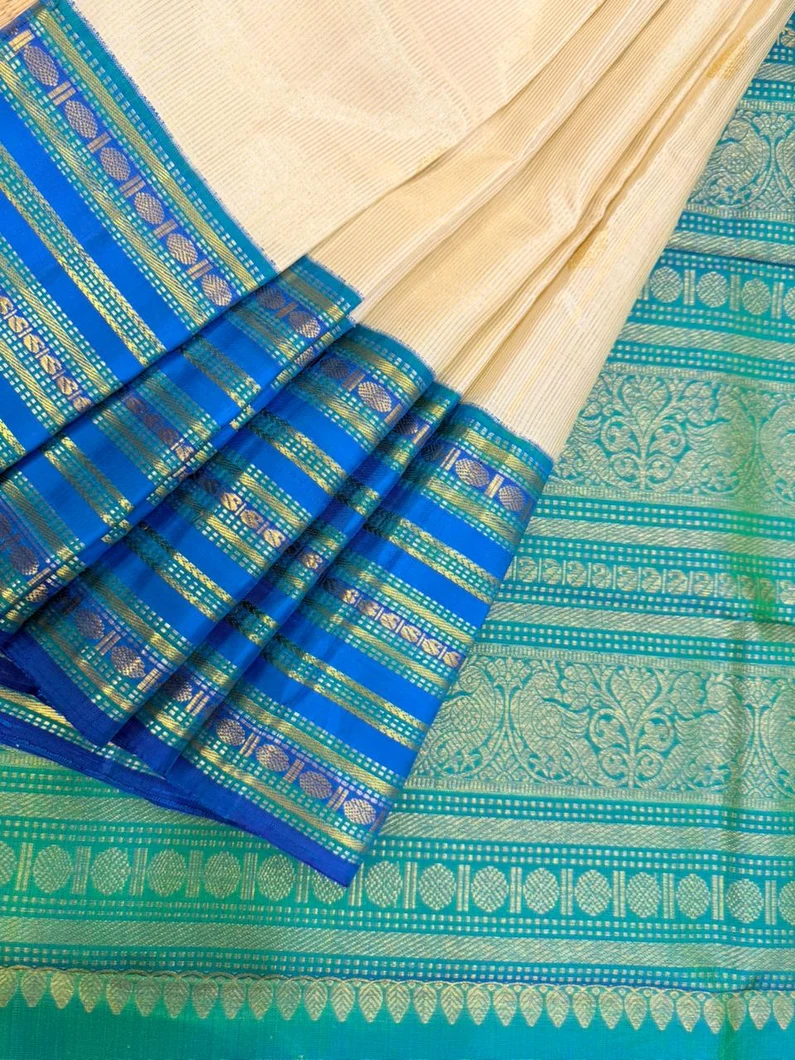 pure-kanchi-silk-saree-in-half-white-with-blue-varisai-pettu-border-sw000001840-a