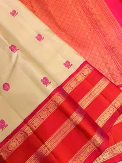 pure-kanchi-silk-saree-in-pista-green-with-orange-varisai-pettu-border-thread-buttas-sw000001841-b