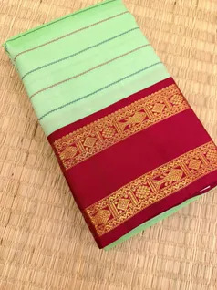 pure-kanchi-silk-saree-in-apple-green-with-red-green-rettai-pettu-border-and-velthari-work-sw000001842-a