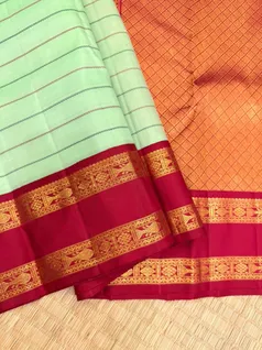 pure-kanchi-silk-saree-in-apple-green-with-red-green-rettai-pettu-border-and-velthari-work-sw000001842-d