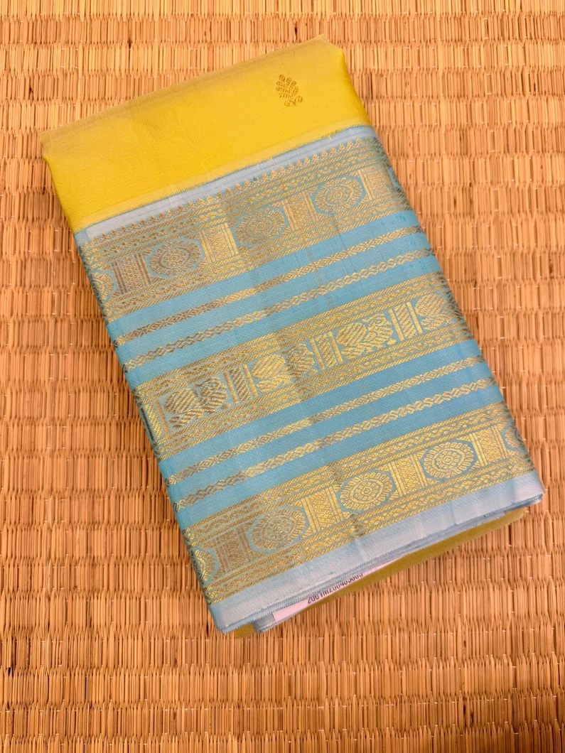 pure-kanchi-silk-saree-in-lime-yellow-with-blue-varisai-pettu-border-sw000001843-a