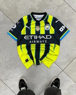 puma-manchester-city-2024-25-trj59-a